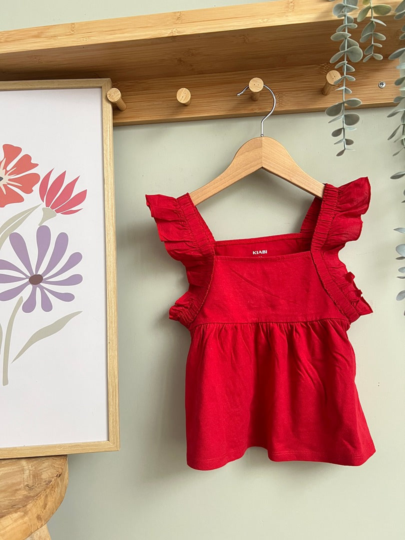 Top Kiabi fille 4 ans rouge à volants sans manches été