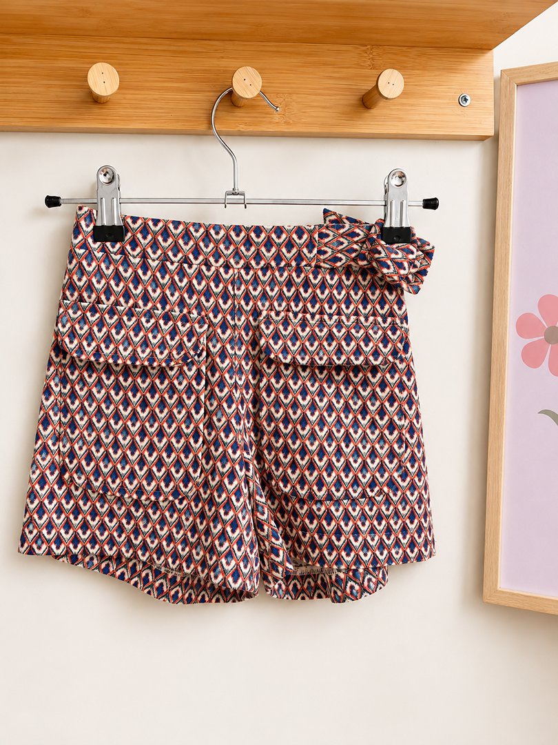 Short fille Zara 7 ans orange motif géométrique été chic